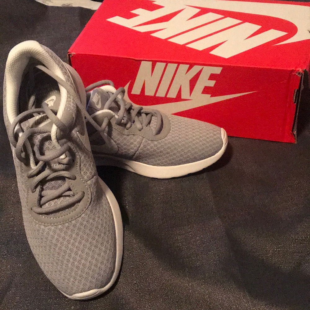 Gray Nike running shoes